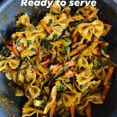 Veggies loaded wheat pasta In spinach tomato gravy A picture of Veggies loaded wheat pasta In spinach tomato gravy.
