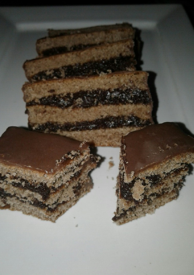Una foto de Budín de chocolate y dulce de leche con ganache de chocolate.🍫