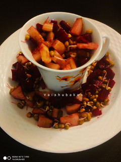 A picture of Beet and Sprouts Salad cup.