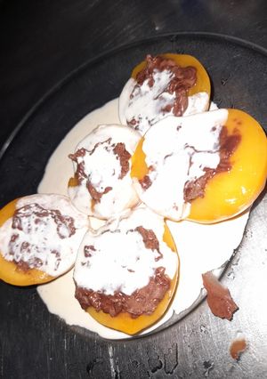 Una foto de Durazno + chocolate 🍫 🤤🤤