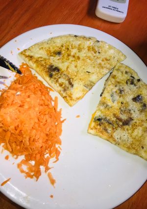 Una foto de Omelette con champignon y cheddar !!