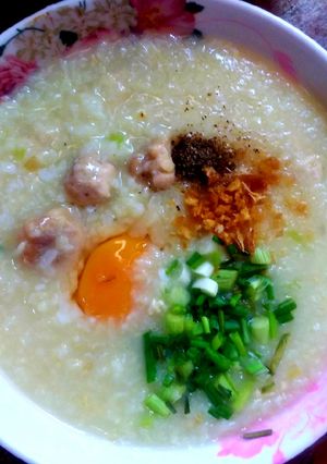 รูปของ โจ๊กไก่ใส่ไข่