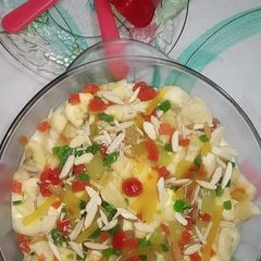 A picture of Holi special colorful fruit loaded creamy bowl🎈🎈🍎🍌🍊🍇.