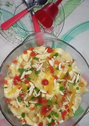 A picture of Holi special colorful fruit loaded creamy bowl🎈🎈🍎🍌🍊🍇.