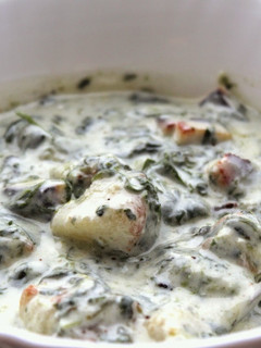 A picture of Potato paneer and Spinach Salad.