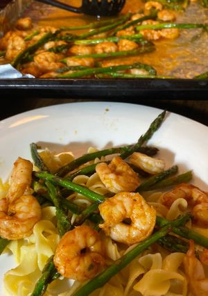 A picture of Buttery boiled shrimp and Asparagus.