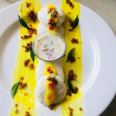 A picture of Rasmalai topping with kesari Rabri.