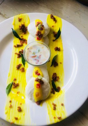 A picture of Rasmalai topping with kesari Rabri.