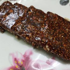 A picture of Peanut-sesame chikki (peanut brittle).