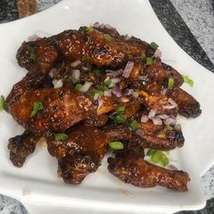 A picture of Sticky sweet chicken wings.
