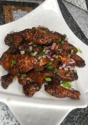 A picture of Sticky sweet chicken wings.