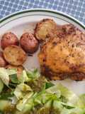 Muslos con papas al horno