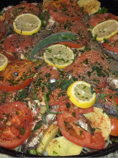 Una foto de Sardina🐟 al horno con verduras🍅🥔