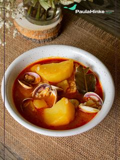 Una foto de Arroz caldoso con patatas y almejas