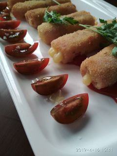 Una foto de Flamenquines de lacón y queso cheddar