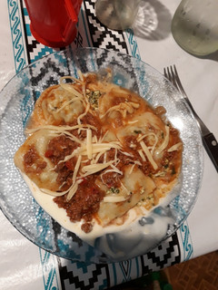 Una foto de Sorrentinos con salsa boloñesa