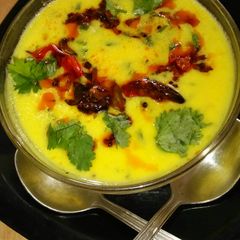 A picture of Methi leaves pakoda kadhi.