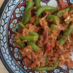 Green beans (cumin, tomato + garlic) A picture of Green beans (cumin, tomato + garlic).