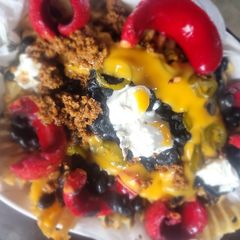 A picture of Loaded Waffle Fries (w/meats, beans, chz, jalepeno, sour cream).
