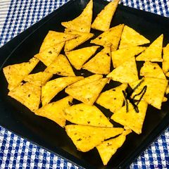 A picture of Homemade Spicy nacho chips.