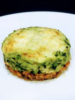 Una foto de Timbal de calabacín y boniato gratinado
