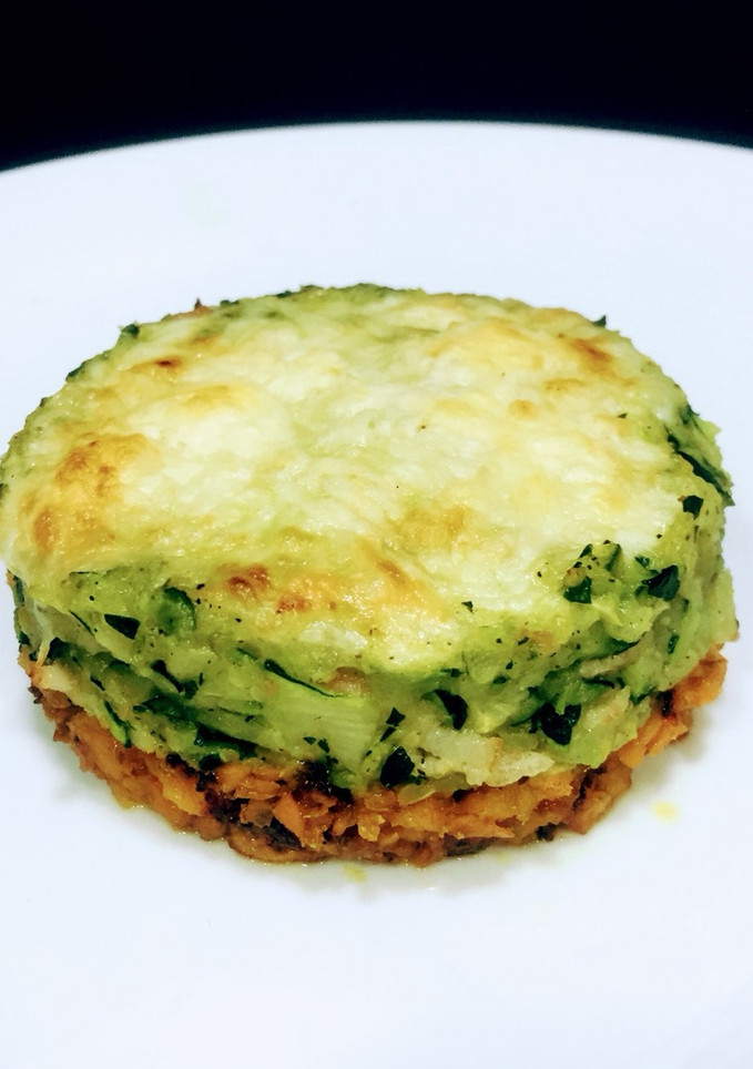 Una foto de Timbal de calabacín y boniato gratinado