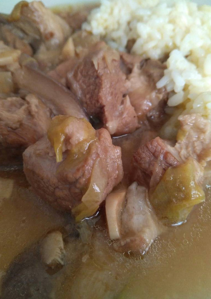 Una foto de Secreto de cerdo blanco con setas