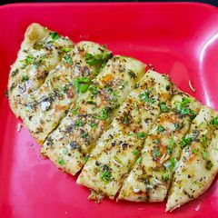 A picture of Domino's Style Cheesy Garlic Bread.