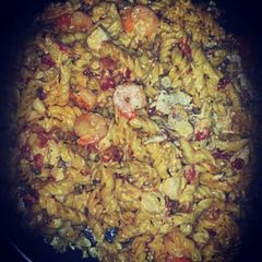 A picture of Cajun chicken shrimp and bacon pasta.