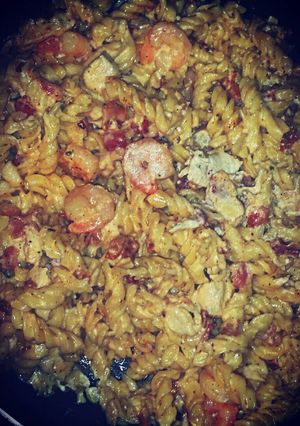 A picture of Cajun chicken shrimp and bacon pasta.