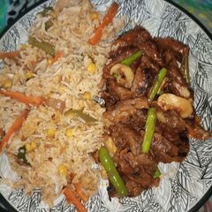 A picture of Corn Veg Pulao with beef chilli.