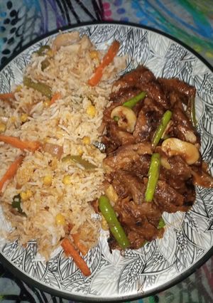 A picture of Corn Veg Pulao with beef chilli.