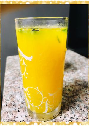 A picture of Muddled mint orange juice.