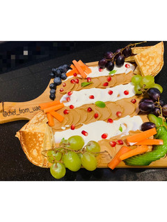 A picture of Peanut Butter Board with cream cheese & pancakes.