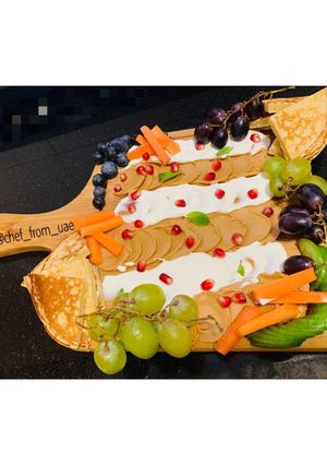 A picture of Peanut Butter Board with cream cheese & pancakes.