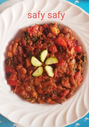 A picture of Foul Medames with Charcoal.