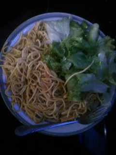A picture of Spaghetti with lettuce.
