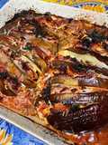 Éventails d'aubergine italienne aux deux jambons, tomates et girolles