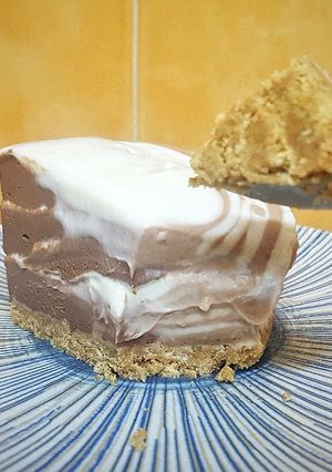 Una foto de Cheesecake tres chocolates