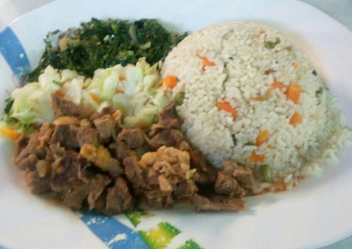 Vegetable rice served with beef stew and vegetables