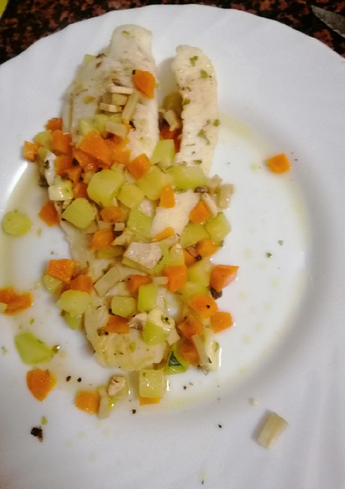 Una foto de Filete de merluza al papillote