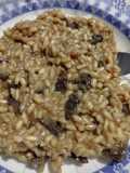 Risotto cremoso con hongos de pino y puré de calabaza