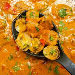 Stuffed clams gravy A picture of Stuffed clams gravy.