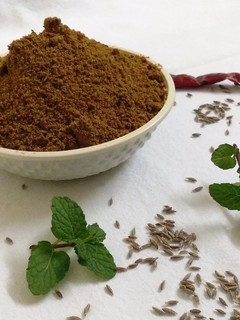 A picture of #CookClick-Raita masala powder.