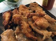 Una foto de filetes de pescado tilapia