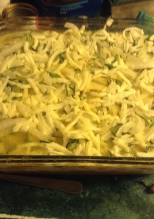 Una foto de Papas al Horno con cebolla .