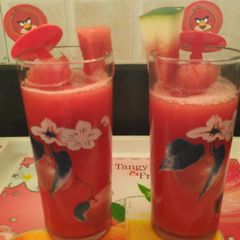 A picture of Watermelon and Orange Juice.