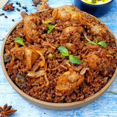 Bhopali Red Rice Chicken Biryani A picture of Bhopali Red Rice Chicken Biryani.