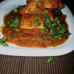 A picture of Lucknow style chicken.