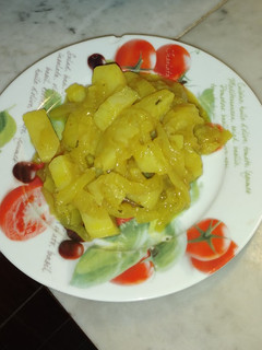 Una foto de Papas al curry